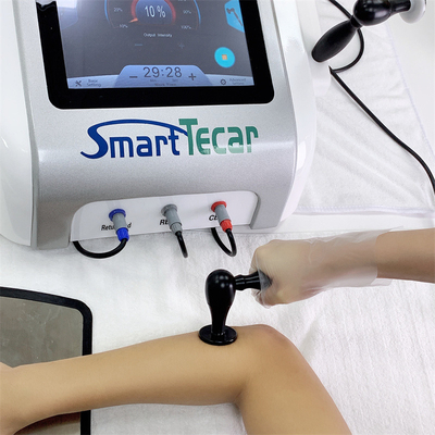 Weiße Chiropraktik-Dorn-Schmerz Tecar-Diathermie-Therapie-Maschine für die chronischen Schmerz